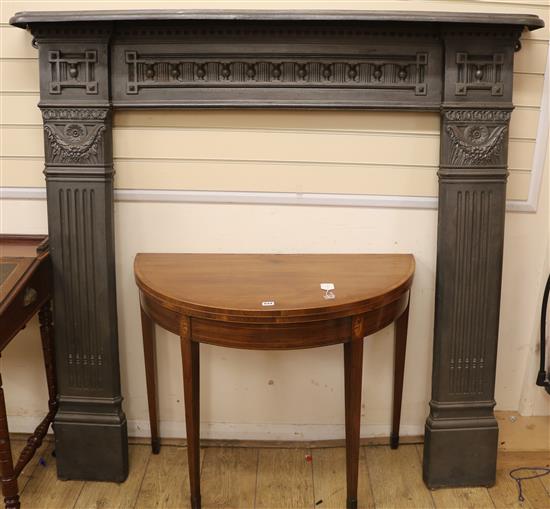 A 19th century cast iron fire surround W.150cm
